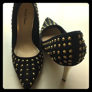 Black with gold stud pointed toe pumps